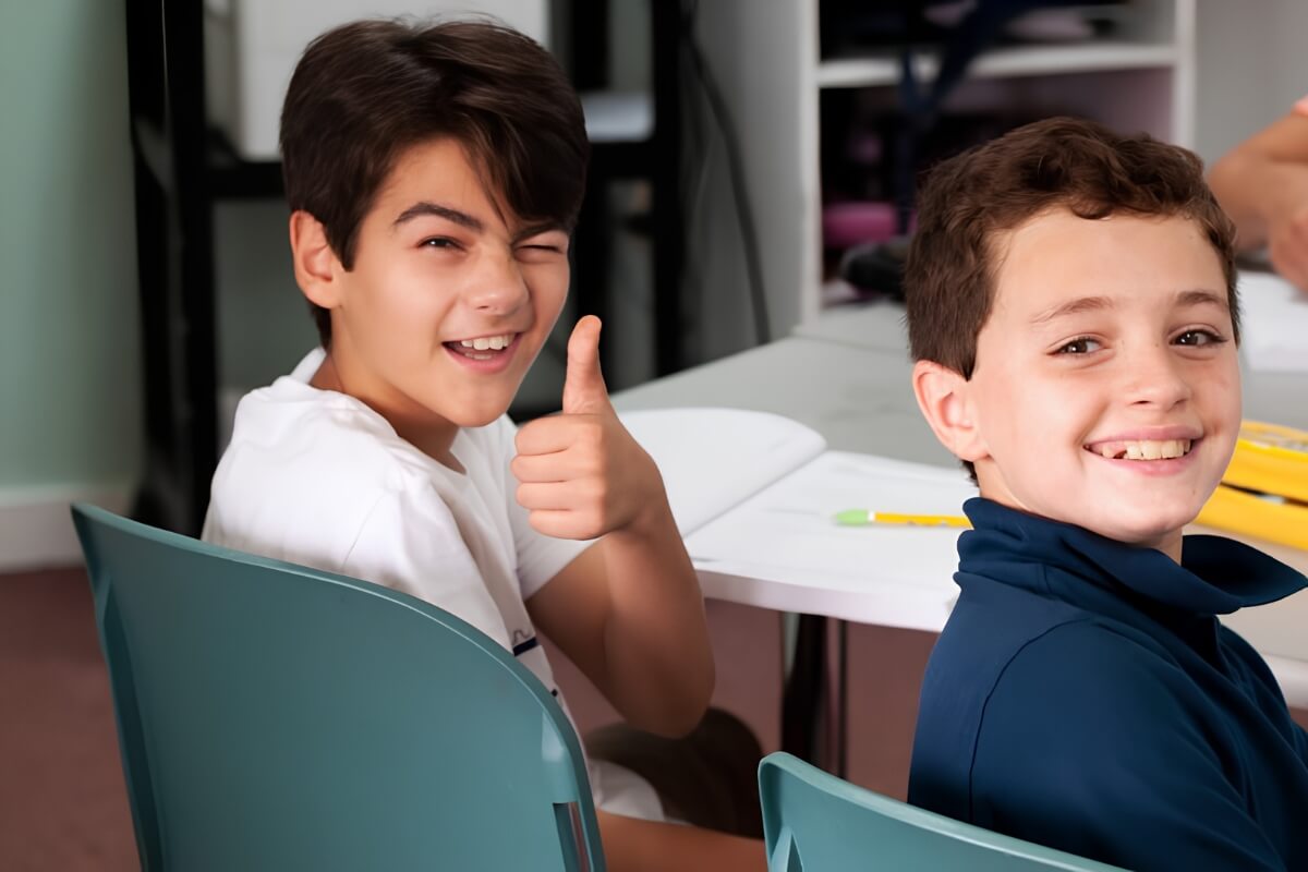 Two young students learning in the classroom.